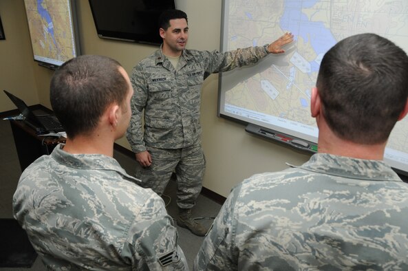 Maj. William Wilkinson, 173rd Operations Group F-15C Intelligence Formal Training Unit (IFTU) course chief, briefs students from the second class to attend the new course at Kingsley, March 12, 2013. This class recently moved from Tyndall AFB to Kingsley Field. (Oregon Air National Guard photo by Tech. Sgt. Jefferson Thompson, 173rd Fighter Wing Public Affairs)