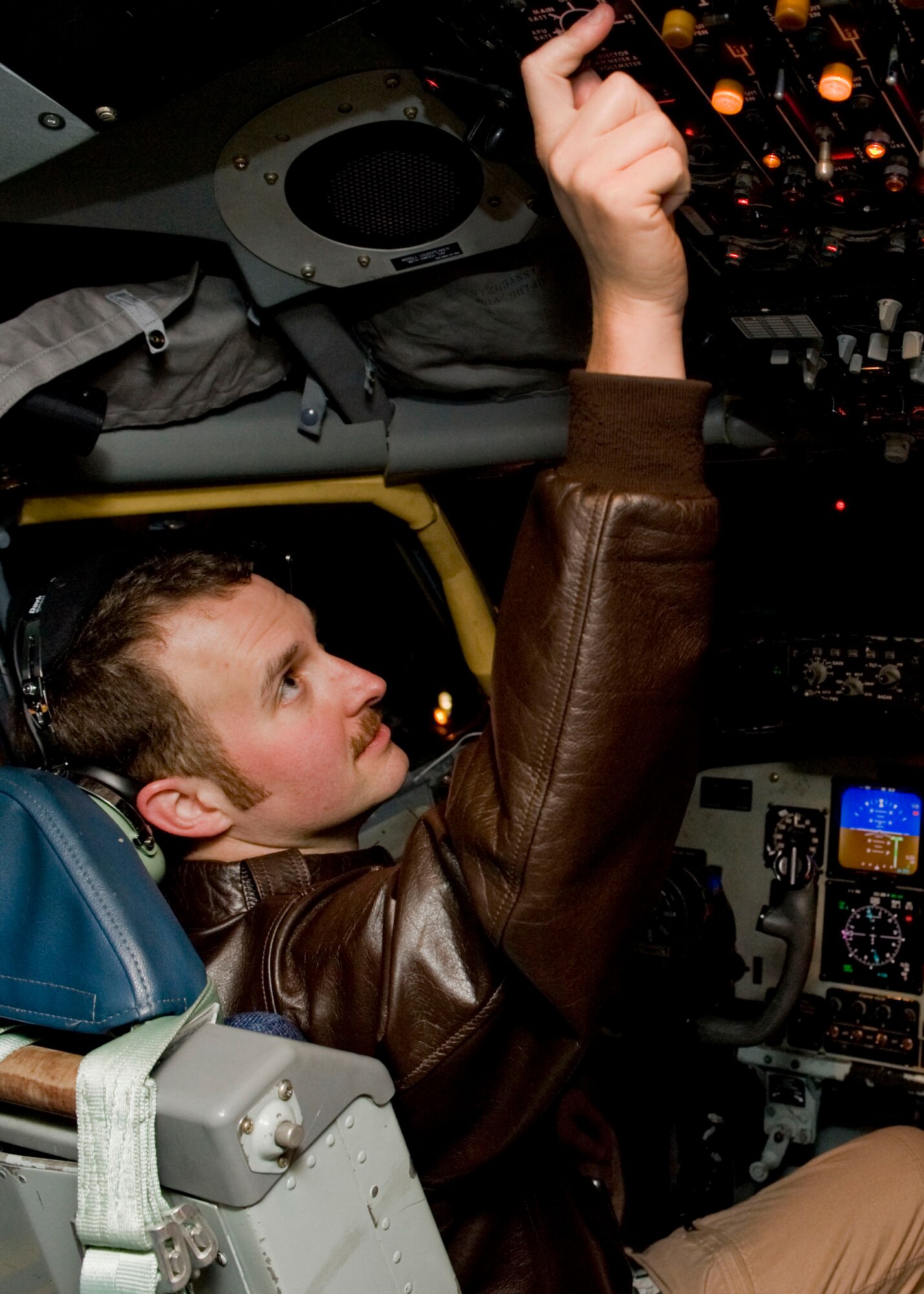 Capt. Robert Rutland, 22nd Expeditionary Air Refueling Squadron aircraft commander, performs pre-flight operational checks on a KC-135 Stratotanker March 13, 2013, at Transit Center at Manas, Kyrgyzstan. Rutland and his crew are flying an operational mission into Afghanistan. Rutland is deployed from Seymour-Johnson Air Force Base, N.C., and is a native of Houston, Texas. (U.S. Air Force photo/Staff Sgt. Stephanie Rubi)