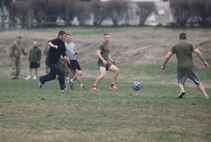 U.S. Marines and Sailors of Black Sea Rotational Force and the 4th Infantry Brigade Soldiers from the Republic of Georgia play a friendly game of soccer during some down time while participating in Agile Spirit joint exercise aboard Vaziani Airfield base, March 17, 2013.
