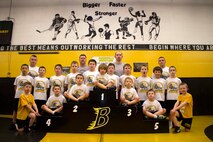 Four members of the Burnsville Sparks Wrestling Program concluded their regular season last week by qualifying for the 2013 USA Wrestling Youth Minnesota State Championships. The wrestlers include Jordan Scott, 11, Jude De La Luz, 8, Isaac Gawronski, 8, and Gavin Osterhaus, 11. Recruiting Station Twin Cities Commanding Officer Maj. Kenneth Gawronski and Officer Selection Station Twin Cities' Gunnery Sgt. Roland McGinnis volunteered to help coach the wrestling club this season. 