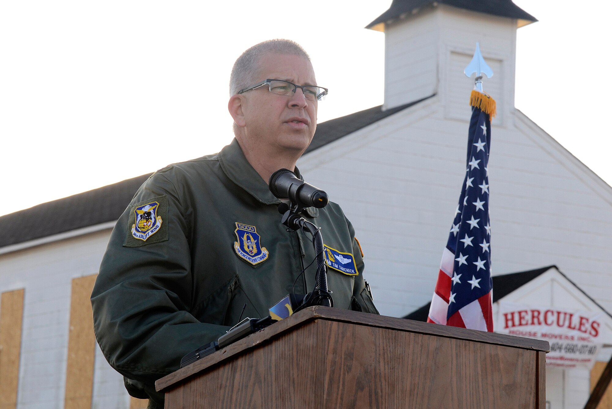 Col. Tim Tarchick, 94th Airlift Wing commander, speaks at a ceremony commemorating the relocation of the Dobbins Air Reserve Base chapel held prior to its move across the runway and to Clay Army National Guard Camp, Ga., March 17. Dobbins has been home to the chapel for over 60 years and has played a large role in member’s lives, both past and present. (U.S. Air Force photo/Don Peek)