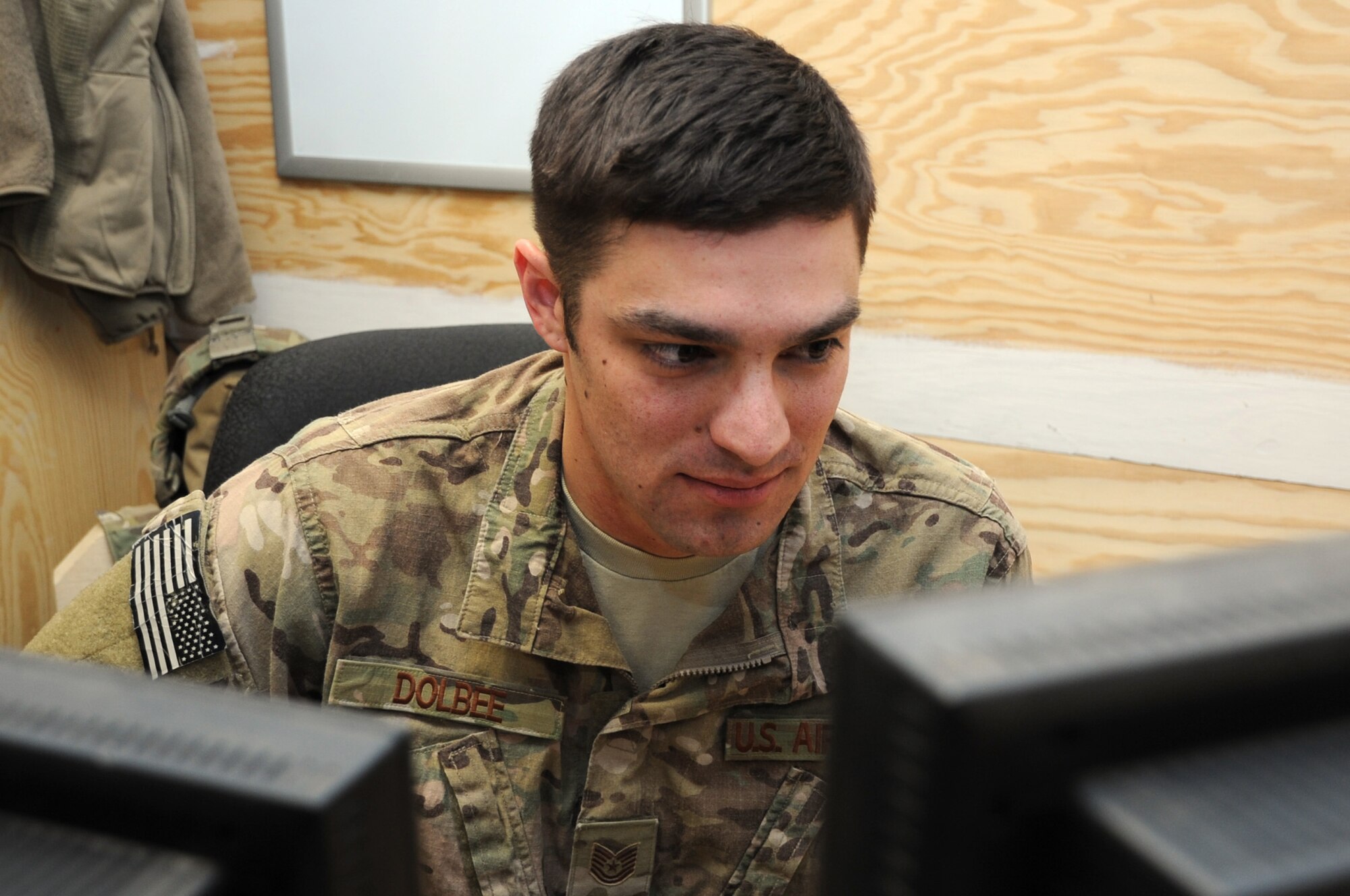Tech. Sgt. John Dolbee, 755th Expeditionary Security Forces Squadron NCO in charge of intelligence, conducts intelligence operations on Bagram Airfield, Afghanistan, March 13, 2013. Dolbee collects and briefs gathered intelligence to seven squads conducting security missions over 172 square miles of battlespace surrounding BAF. (U.S. Air Force photo/Staff Sgt. David Dobrydney)