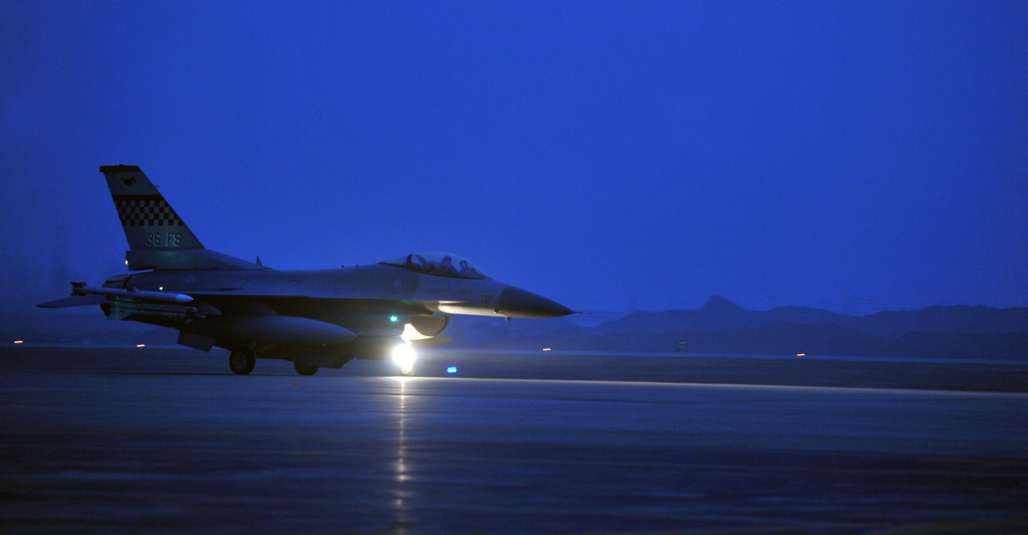An F-16 Fighting Falcon from the 36th Fighter Squadron taxis for takeoff for the first combat sortie of Operational Readiness Exercise Beverly Midnight 13-02 at Osan Air Base, Republic of Korea, March 19, 2013. The wing executes military operations to beddown, maintain and employ follow-on forces for the combined arms base. (U.S. Air Force photo/Senior Airman Alexis Siekert)