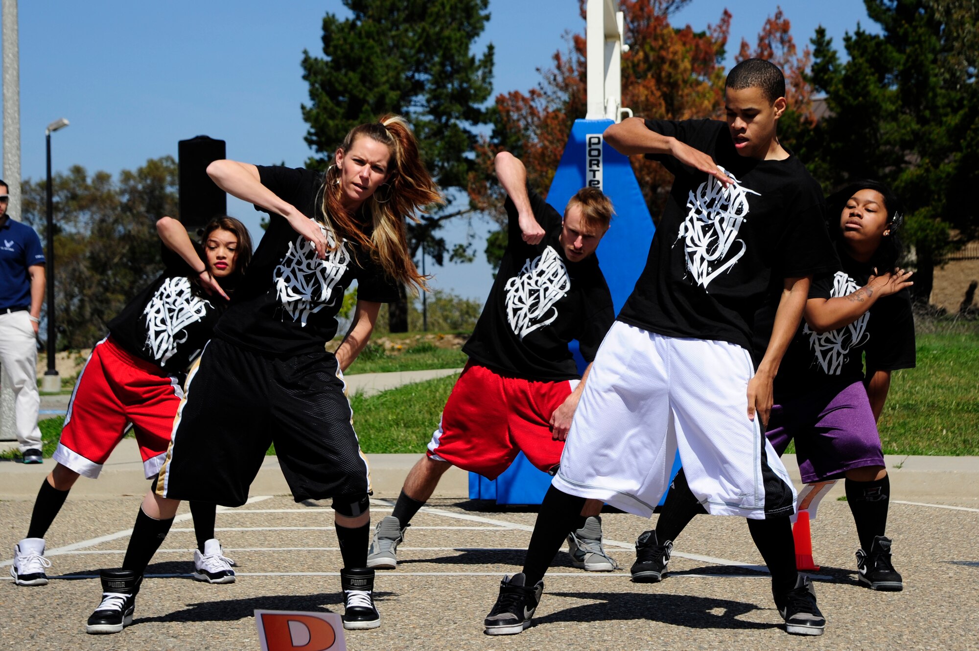 VANDENBERG AIR FORCE BASE, Calif. – A “flash mob” begins their choreographed routine during the Wingman Days’ festivities at the Pacific Coast Club here Friday, March 15, 2013. This Wingman Day event gave more than 4,000 Airmen the opportunity to interact with each other and to learn about different topics such as branding yourself and interpersonal relationship skills. (U.S. Air Force photo/Senior Airman Lael Huss)