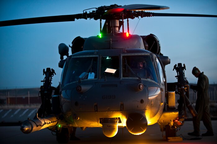 An HH-60 Pave Hawk from the 34th Weapons Squadron of the U.S. Air Force Weapons School out of  Nellis Air Force Base, Nev., powers down after arriving at Gowen Field, Idaho, March 8, 2013 . The 34th WPS is conducting the terminal employment phase of the weapons school syllabus. (U.S. Air Force photo by Senior Airman Brett Clashman)