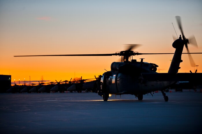An HH-60 Pave Hawk from the 34th Weapons Squadron of the U.S. Air Force Weapons School out of Nellis Air Force Base, Nev., taxis down the runway after its arrival for terminal employment phase March 8, 2013, at Gowen Field, Idaho. The "T.E." phase will be conducted over the Orchard Training Ranges at Boise, Idaho. (U.S. Air Force photo by Senior Airman Brett Clashman)