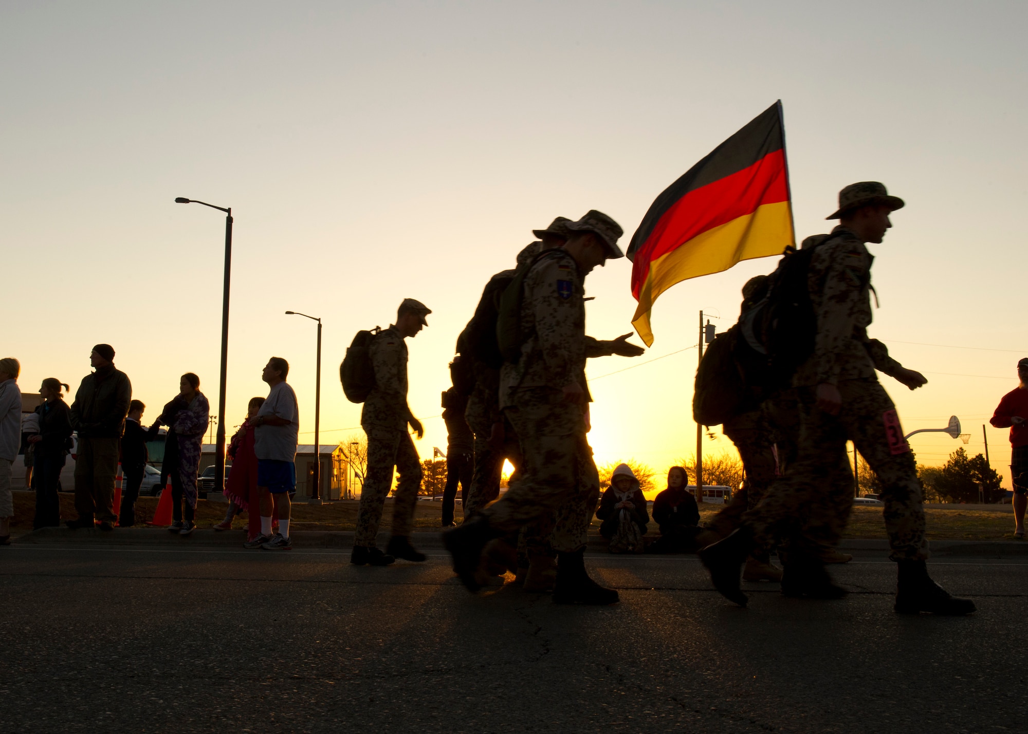 Participants in the Bataan Memorial Death March begin their trek through the sand at White Sands Missile Range, N.M., March 17. The event included both a full 26.2-mile marathon and a 15.2-mile honorary march. More than 5,800 people from across the world participated in the 26.2-mile memorial march to honor the 76,000 prisoners of war who were forced to endure marching nearly 80 miles under brutal conditions during World War II. (U.S. Air Force Photo by Airman 1st Class Michael Shoemaker/Released)