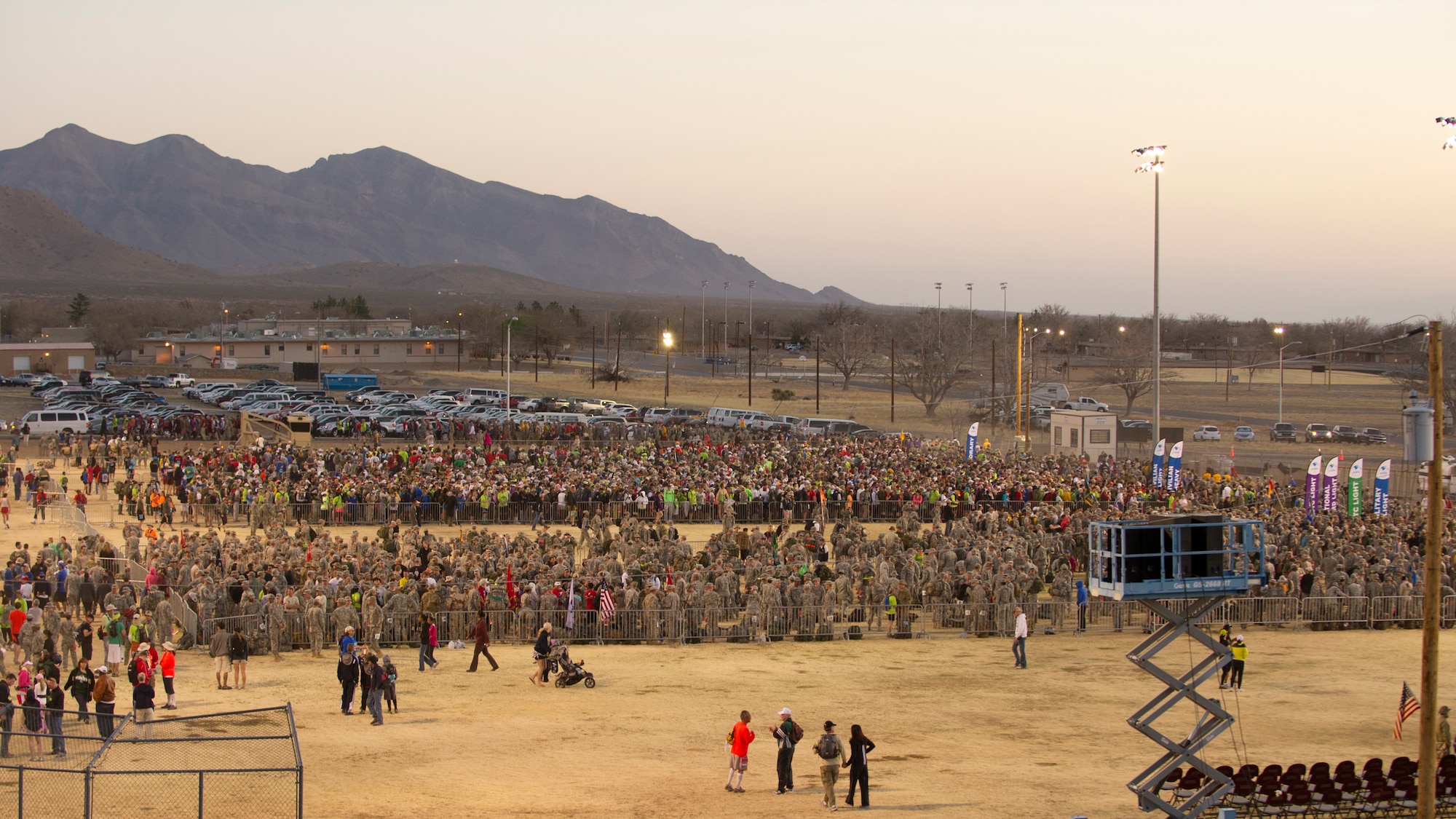 Participants in the 24th annual Bataan Memorial Death March gather during the opening ceremony at White Sands Missile Range, N.M., March 17. More than 5,800 people from across the world participated in the 26.2-mile memorial march to honor the 76,000 prisoners of war who were forced to endure marching nearly 80 miles under brutal conditions during World War II. (U.S. Air Force Photo by Airman 1st Class Michael Shoemaker/Released)
