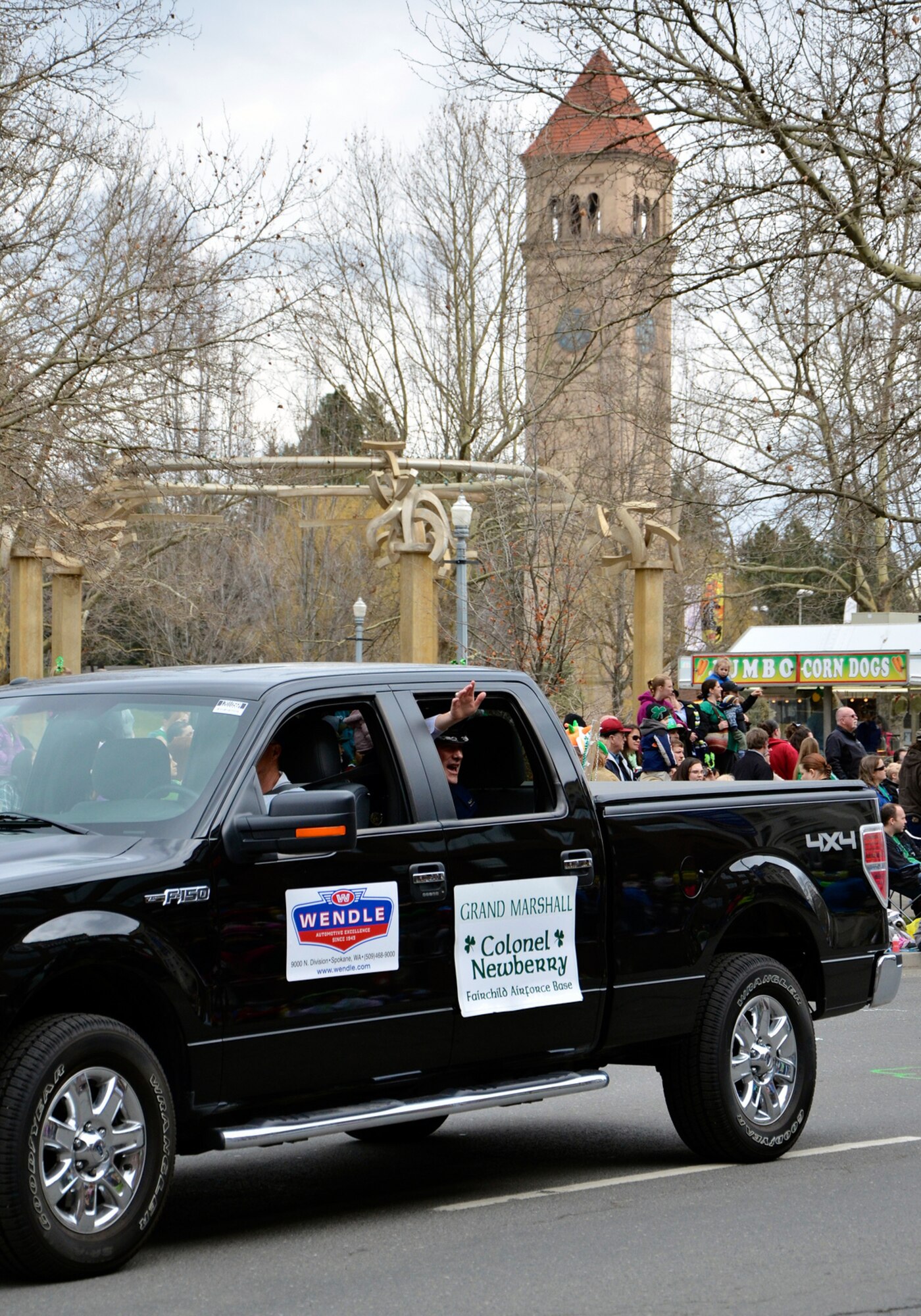 Col. Brian Newberry, the 92nd Air Refueling Wing commander, waves at community members during the 34th Annual St. Patrick’s Day Parade held in downtown Spokane, Wash., and organized by The Friendly Sons of St. Patrick non-profit organization March 16, 2013. The event is open for all to get with many of the volunteers coming from Team Fairchild. Newberry served as the parade’s grand marshall. (U.S. Air Force photo by Senior Airman Benjamin Stratton)