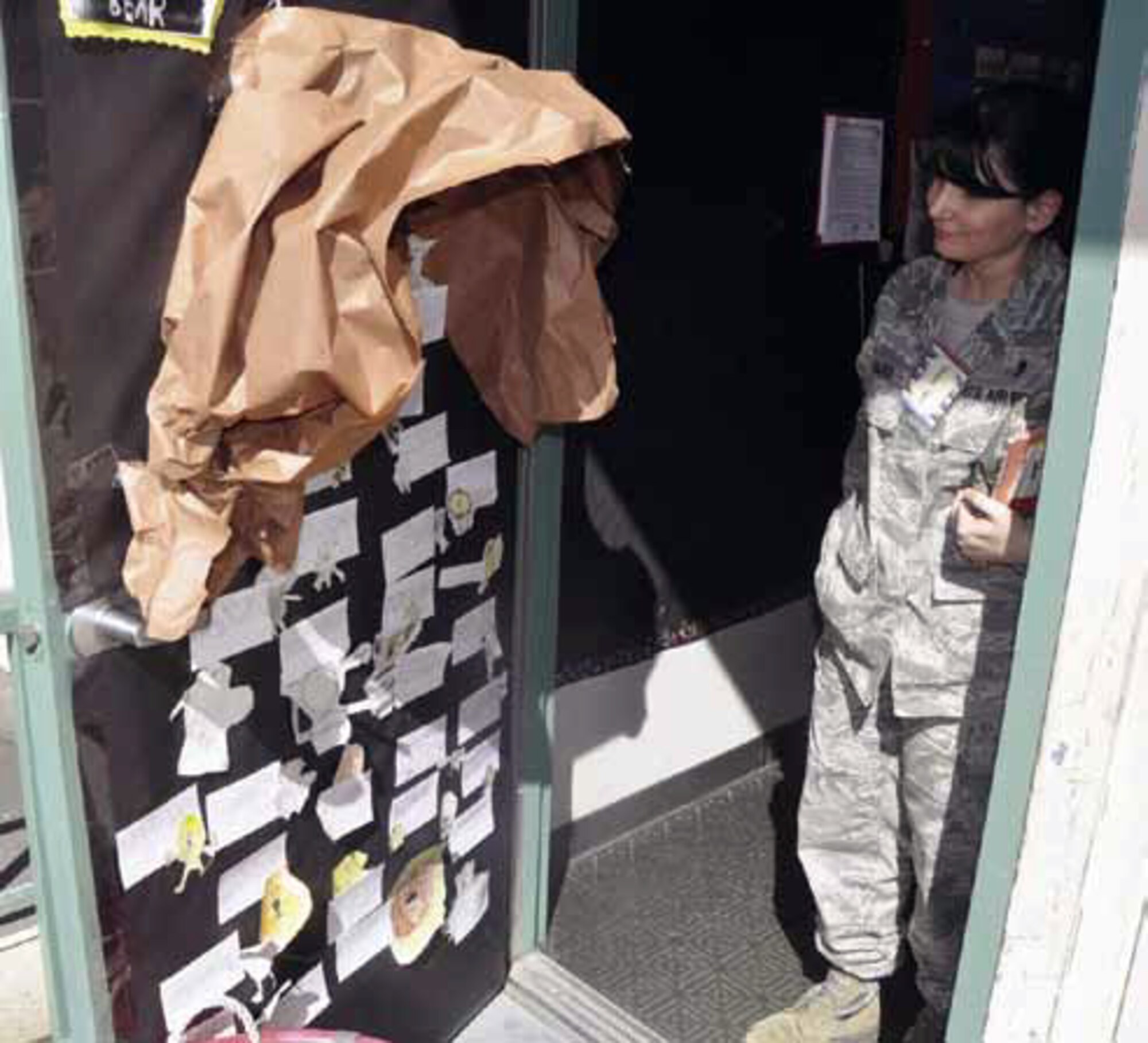 “This is not my first year volunteering for the Read Across America program,” said Senior Master Sgt. Tammy Haro, 752d Medical Squadron. “I come back year after year because I truly appreciate the value of reading and how it helps our kids grow into positive adults — plus, I think I get more enjoyment out of it than the kids. They did a great job decorating their doors — I couldn’t pick just one.” (U.S. Air Force photo by Darnell Gardner)