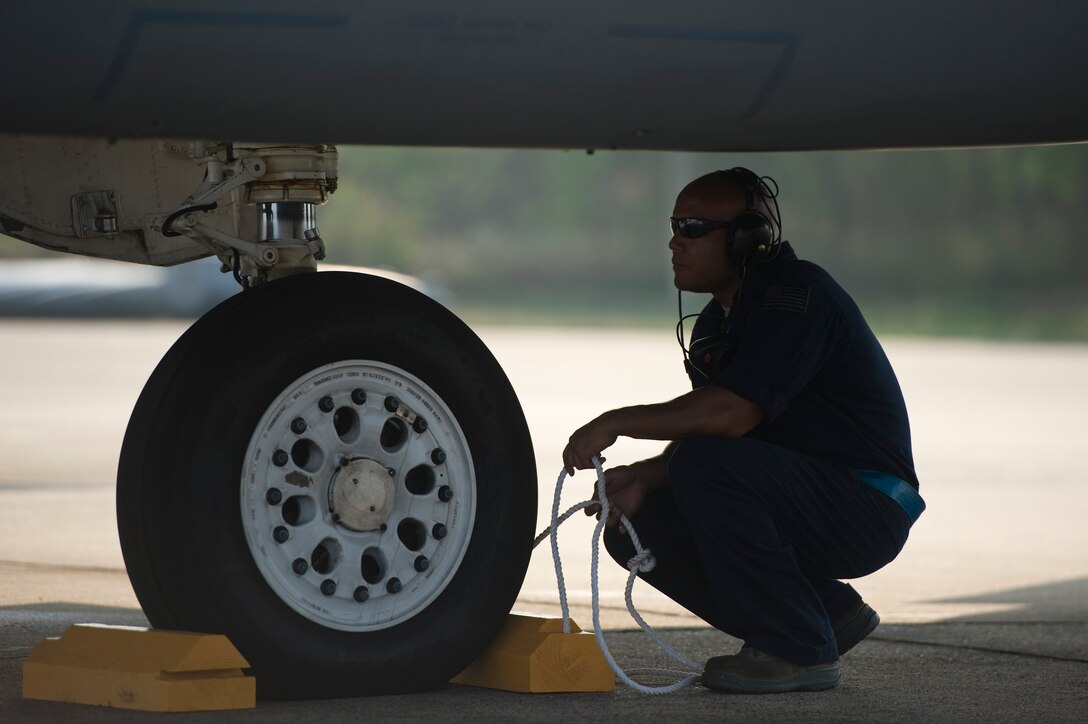 Staff Sgt. Christopher Stell monitors an F-15C Eagle before flight operations during Cope Tiger 13 March 11, 2013, at Korat Royal Thai Air Force Base, Thailand. Cope Tiger is an annual multilateral aerial exercise designed to improve readiness and cooperation between U.S., Thai and Singaporean forces. Stell is a crew chief assigned to the 44th Aircraft Maintenance Unit.  (U.S. Air Force photo/2nd Lt. Jake Bailey)