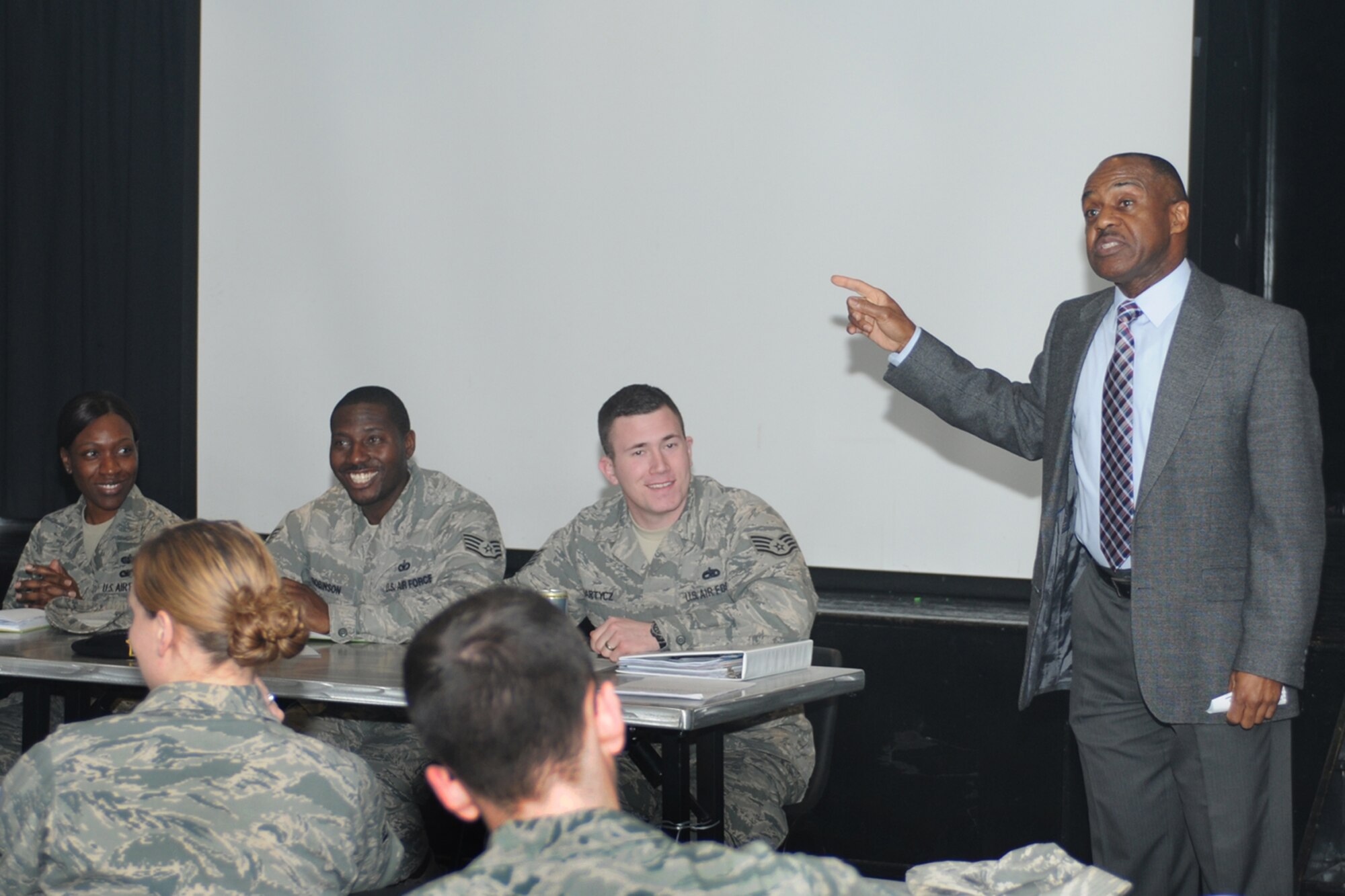 ROYAL AIR FORCE LAKENHEATH, England -- Edward Cole, community support coordinator, briefs the RAF Lakenheath Air Force Sergeants Association on the new Air Force Resiliency Program at the 48th Avenue Community Activities Center March 7, 2013. The Air Force Resiliency Program operationalizes four pillars -- mental, physical, social and spiritual -- that together uphold the Comprehensive Airmen Fitness Program. (U.S. Air Force photo by Airman 1st Class Dana J. Butler)