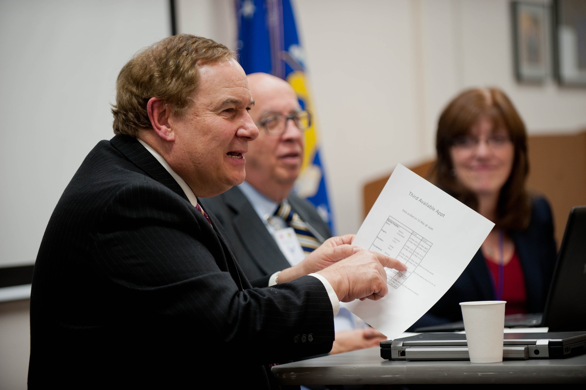 Benjamin Snyder, Association for Ambulatory Health Care, Inc. chair surveyor, discusses his findings after a three-day inspection of the 28th Medical Group at Ellsworth Air Force Base, S.D., March 14, 2013. The team’s approach was consultative and educational, presenting best practices to help the organization improve its care and services. (U.S. Air Force photo by Airman 1st Class Zachary Hada/Released)