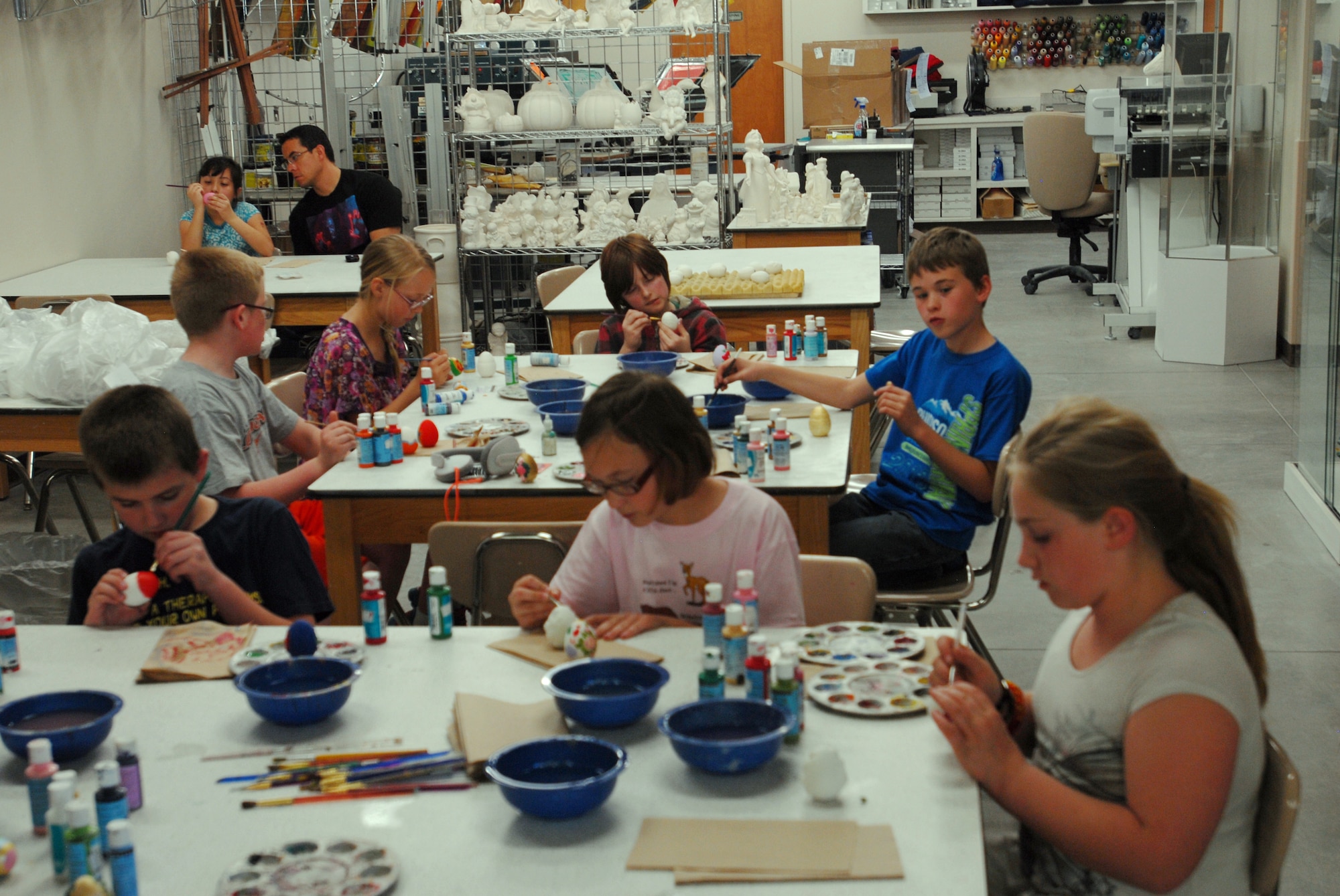 GOODFELLOW AIR FORCE BASE, Texas – Members of the Youth Center work quietly on their individual ceramic eggs March 15 at the Arts and Craft center. The Arts and Crafts center offers the introduction of pottery as well as ceramic painting classes (U.S. Air Force photo/ Airman 1st Class Breonna Fields)