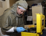 Airman 1st Class Nicolette Sanchez, 359th Aerospace-Medicine Squadron Bioenvironmental Engineering Flight technician, tests a substance using the HazMatID, a hazardous material identifier. (U.S. Air Force photo by Melissa Peterson)