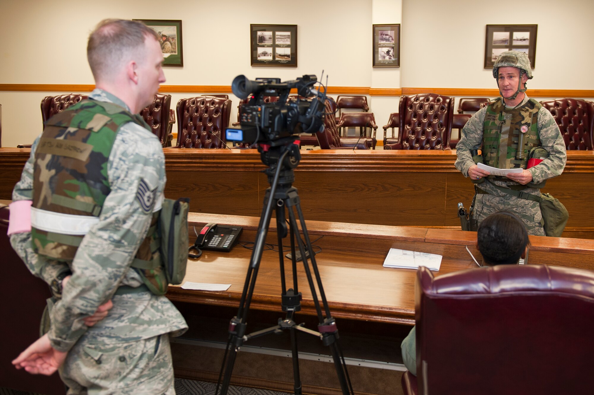 Col. John Pearse, 8th Fighter Wing commander, answers a question from Tech. Sgt. Alexander Griffin, 8th FW Public Affairs, during a mock press conference at Kunsan Air Base, Republic of Korea, Mar. 18, 2013. The conference was part of exercise Beverly Midnight 13-2 and assessed the wing’s ability to respond to media inquiries. (U.S. Air Force photo by Staff Sgt. Jonathan Fowler/Released)