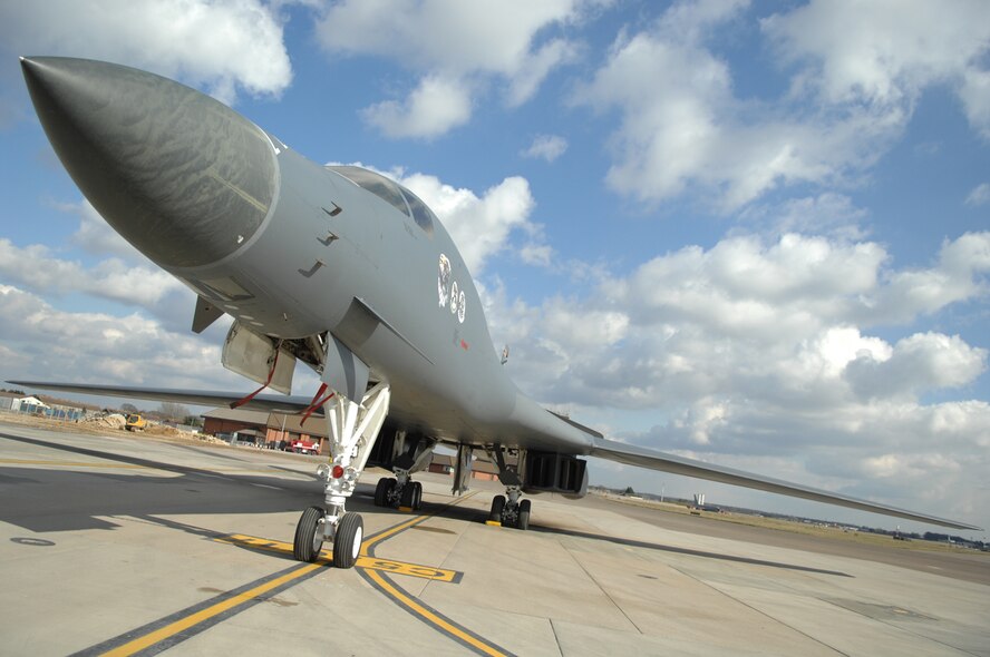 A transient B-1B Lancer from the 28th Bomb Wing, Ellsworth Air Force Base, S.D., sits on the RAF Mildenhall flightline March 14, 2013. The B-1B Lancer is a supersonic bomber capable of delivering up to a 75,000 pound (34,019 kilogram) payload. The Lancer is used by the U.S. Air Force as a global reach multi-purpose bomber and can rapidly deliver precision and non-precision weapons against any adversary, anywhere in the world, at any time. (U.S. Air Force photo by Airman 1st Class Dillon Johnston/Released)