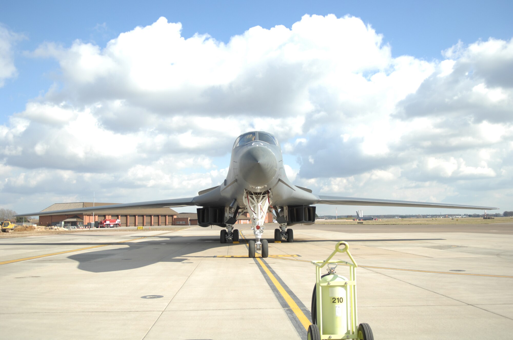 A B-1B Lancer, here from the 28th Bomb Wing, Ellsworth Air Force Base, S.D., sits on the airfield at RAF Mildenhall March 14, 2013. The B-1B is the backbone of America’s long-range bomber force. The aircraft’s blended wing and body configuration, variable-geometry wings and turbofan afterburning engines combine to provide long range, manoeuvrability and high speed, while enhancing survivability.(U.S. Air Force photo by Airman 1st Class Dillon Johnston/Released)