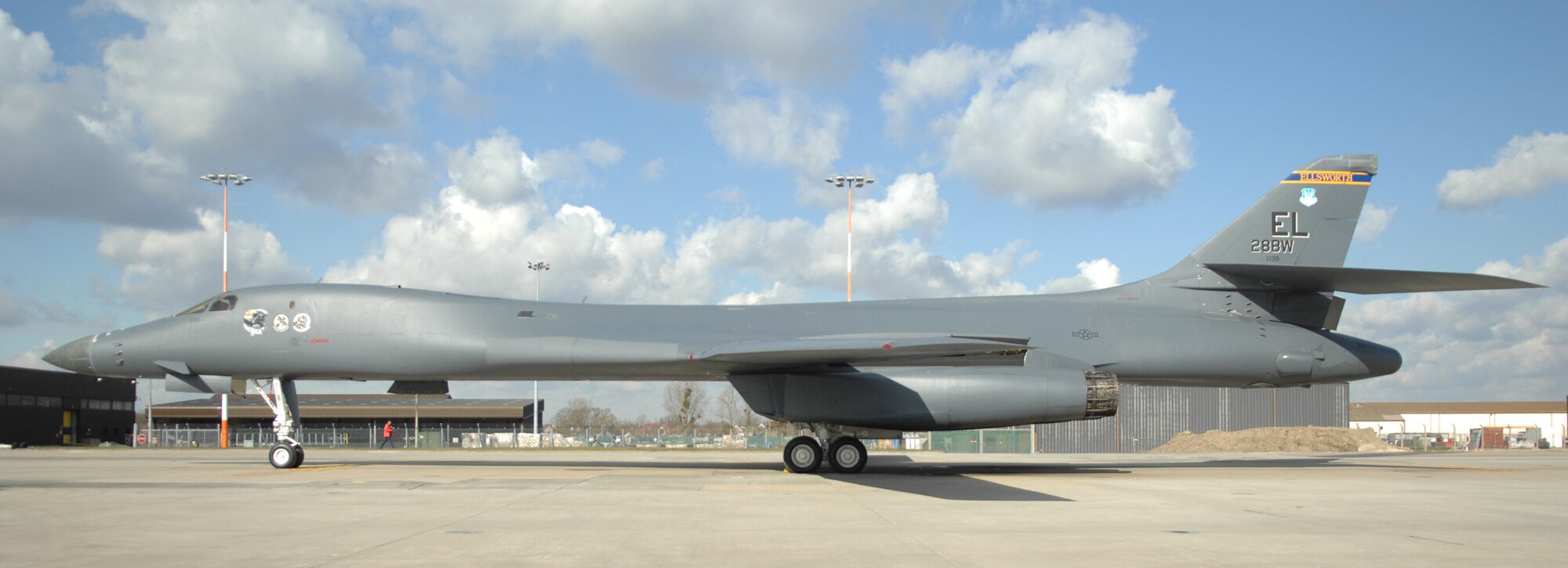 A transient B-1B Lancer from the 28th Bomb Wing, Ellsworth Air Force Base, S.D., sits on the RAF Mildenhall flightline March 14, 2013. The B-1B Lancer is a multi-mission bomber, capable of carrying the largest payload of both guided and unguided weapons in the U.S. Air Force inventory. The platform has global reach capability and can deliver up to a 75,000 pound (34,019 kilogram) payload. (U.S. Air Force photo by Airman 1st Class Dillon Johnston/Released)