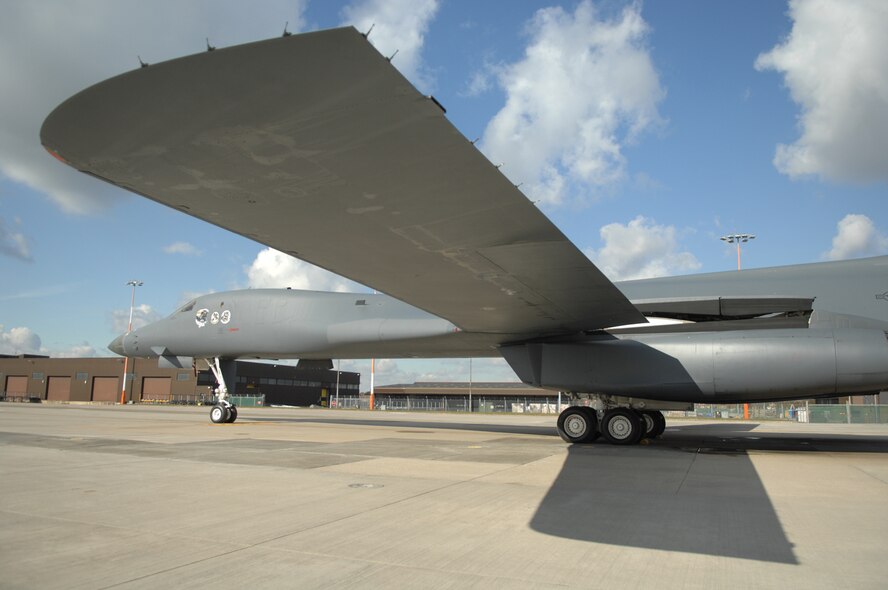 A B-1B Lancer, here from the 28th Bomb Wing, Ellsworth Air Force Base, S.D., sits on the airfield at RAF Mildenhall March 14, 2013, The B-1B is a highly versatile, multi-mission weapon system. Its synthetic aperture radar is capable of tracking, targeting and engaging moving vehicles, as well as self-targeting and terrain-following modes. In addition, an extremely accurate global positioning system-aided inertial navigation system enables aircrews to navigate without the aid of ground-based navigation aids, as well as engage targets with a high level of precision. (U.S. Air Force photo by Airman 1st Class Dillon Johnston/Released)