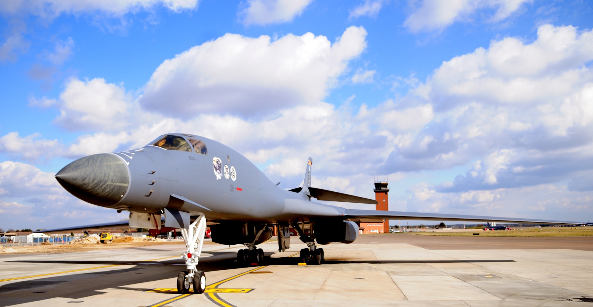 A transient B-1B Lancer from the 28th Bomb Wing, Ellsworth Air Force Base, S.D., sits on the RAF Mildenhall flightline March 14, 2013. The B-1B Lancer is a supersonic bomber capable of delivering up to a 75,000 pound (34,019 kilogram) payload. The Lancer is used by the U.S. Air Force as a global reach multi-purpose bomber and can rapidly deliver precision and non-precision weapons against any adversary, anywhere in the world, at any time. (U.S. Air Force Photo by Karen Abeyasekere/Released)