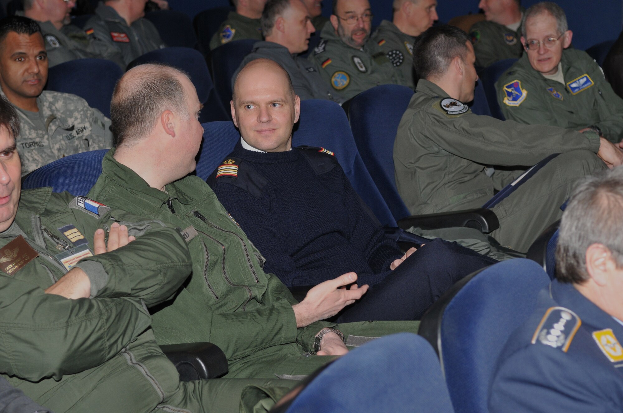 Nearly 200 medical professionals from 16 nations share conversation inside the Hercules Theater here March 11 prior to the beginning of the 28th Annual U.S. Air Forces in Europe-Air Forces Africa European Flight Surgeons Conference. The weeklong conference ended March 15 and focused on the aerospace operations mission, building partnerships and advancements in aerospace medicine. Attendees also took part in the NATO Science and Technology Organization Technical Course.  U.S. Air Force Photo By Tech. Sgt. James M. Hodgman