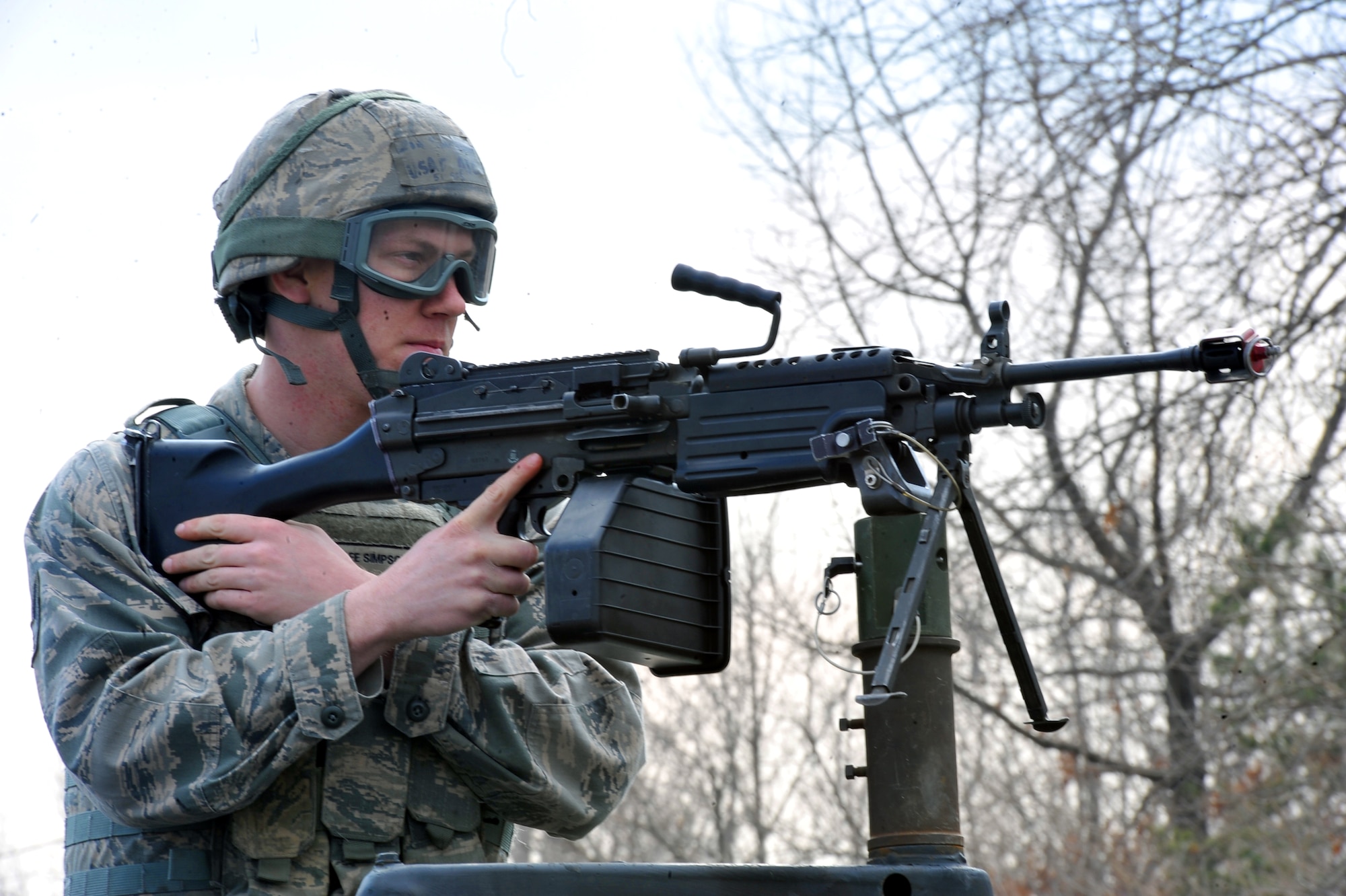 Airman 1st Class Leon Simpson, 51st Security Forces Squadron defender, conducts close surveillance of possible enemy movement during an outside-the-wire joint patrol during a Republic of Korea Army exercise near Osan Air Base March 15, 2013.  The exercise was in conjunction with Key Resolve and is one of the few times each year when the ROK Army fully mobilizes their Homeland Defense Forces.  (U.S. Air Force photo/Senior Airman Alexis Siekert)