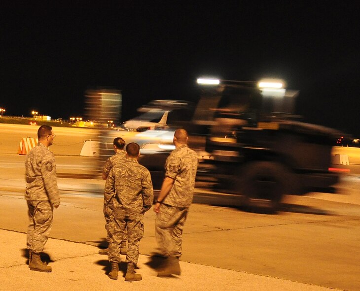 Staff Sgt. Michael Cox (right), 100th Logistics Readiness Squadron, observes Airman 1st Class Aaron Hedtke, 100th LRS, driving a 10,000-pound, all-terrain forklift training at a deployed location in southwest Europe March 14, 2013. Cox, a Tenino, Wash., native, trained a group of Airmen on the forklift. Hedtke is from Appleton, Wis.  Airmen and KC-135 Stratotankers from the 100th Air Refueling Wing, RAF Mildenhall, England, deployed to the 351st Expeditionary Air Refueling Squadron Jan. 26, 2013, to support French operations in Mali. (U.S. Air Force photo by Capt. Jason Smith)