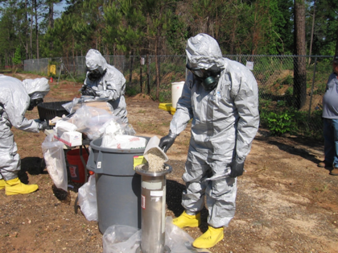A packaging team conducts a survey prior to a removal action for chemical agent identification sets at Fort Benning, Ga. The Huntsville Center Environmental and Munitoins Center of Expertise provides quality assurance and technical support to Corps offices worldwide in their execution of environmental and munitions response missions like this one. 