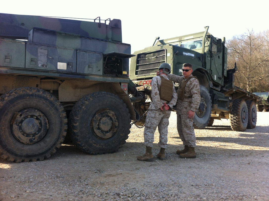 Lance Corporal Micheal T. Morin, CLB-6 is being supervised by Sgt Derick J. Buckley while conducting practical application of lifting a towed load with a AMK36 wrecker prior to operating with a towed load at Ft. Leonard Wood, MO while attending Vehicle Recovery Operator Course 3-12. This is one of the first events that students learn in the course prior to becoming certified as a 3536 NMOS (Vehicle Recovery Operator). 