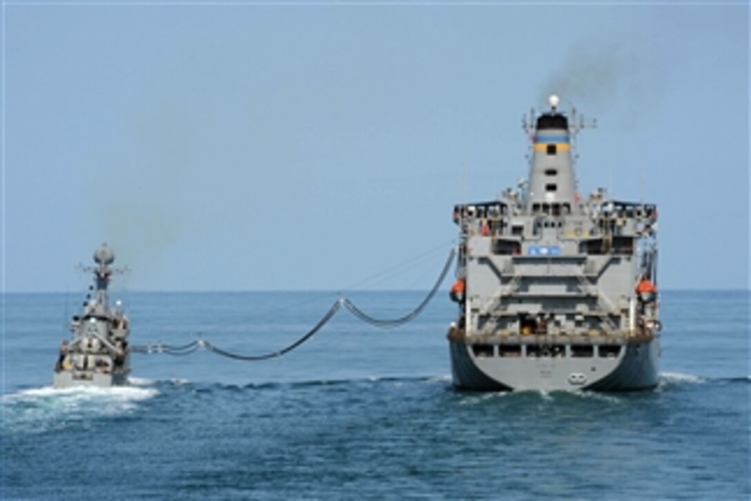 The Military Sealift Command fleet replenishment oiler USNS Pecos (T-AO 197), right, performs a replenishment-at-sea with the South Korean Patrol Combat Corvette Puchon (PCC 773) in the Yellow Sea during exercise Foal Eagle 2013 on March 15, 2013.  Ships from the U.S. 7th Fleet and the Republic of Korea are underway for exercise Foal Eagle 2013 in support of regional security and stability of the Asia-Pacific region.  
