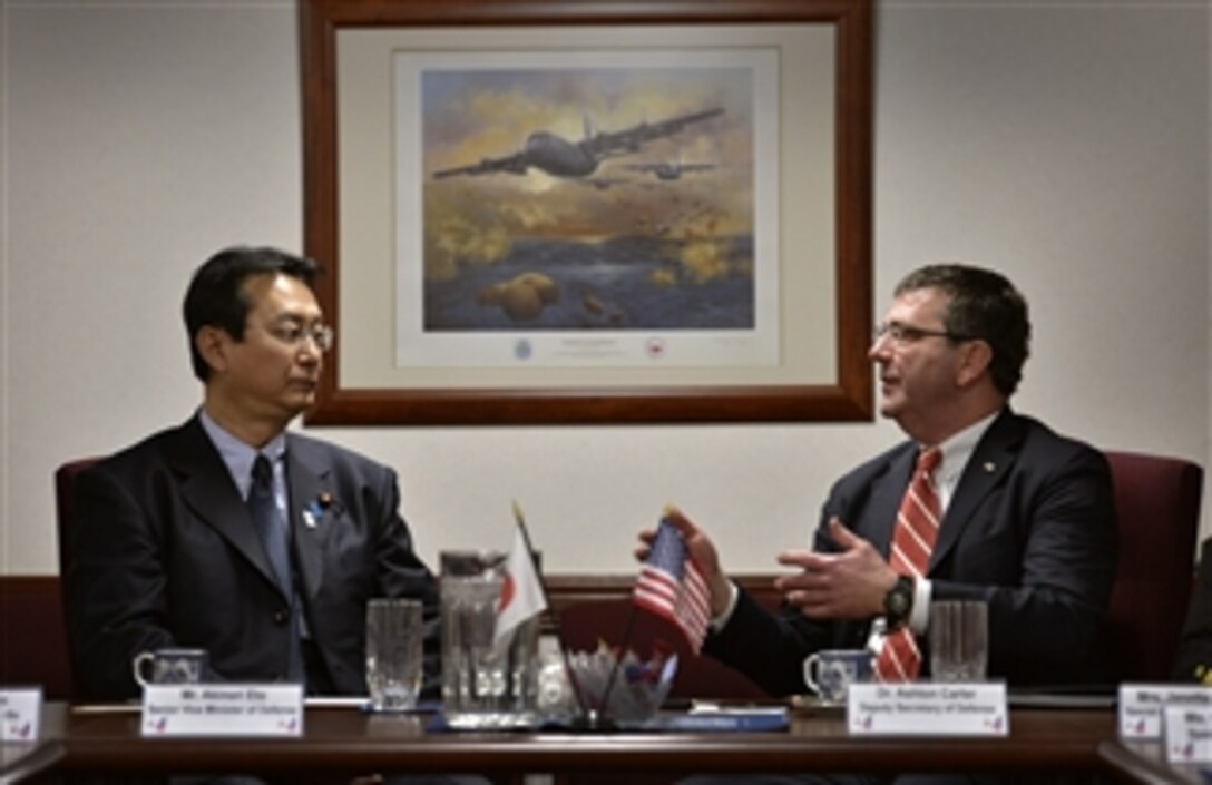Deputy Secretary of Defense Ashton B. Carter, right, meets with Japan's Senior Vice Defense Minister Akinori Eto at Yokota Air Base, Japan, on March 17, 2013. The two defense leaders are meeting to discuss the continued close relationship of U.S. forces and Japan's military as well the ongoing realignment of U.S. Forces toward the Asia-Pacific region.  
