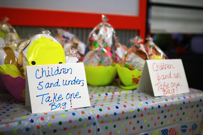 Gift bags lay on a table during an event at the Bonnyman Bowling Center aboard Camp Lejeune, N.C., March 16, 2013. The family readiness officer with Combat Logistics Battalion 22, Combat Logistics Regiment 27, 2nd Marine Logistics Group prepared gift bags for the kids to enjoy and provided pizza, beverages and snacks for the families. 