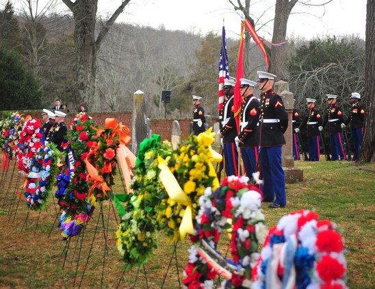 The Marine Corps Base Quantico color guard and honor guard stand at parade rest at the 262nd anniversary of former president James Madison's birth on March 16, 2013. Col. David Maxwell, base commander, was designated as President Barack Obamas' representative for the official wreath-laying ceremony in honor of Madison, the fourth president of the United States.
