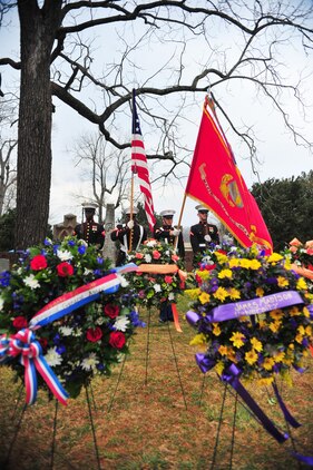 The Marine Corps Base Quantico color guard dips the Marine Corps colors during the Marines hymn behind rows of wreaths at the 262nd anniversary of former president James Madison's birth on March 16, 2013. Col. David Maxwell, base commander, was designated as President Barack Obamas' representative for the official wreath-laying ceremony in honor of Madison, the fourth president of the United States. 