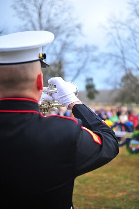 Cpl. Jonathan Staples, a trumpet player for the Quantico Marine Band, plays “Retreat” at the official wreath-laying ceremony in honor of the 262nd anniversary of former president James Madison's birth on March 16, 2013. Madison, the fourth president of the United States, is known as the Father of the Constitution, because of his pivotal role in the document's drafting.