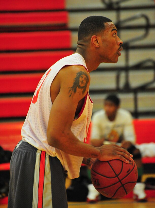 Bryan Shuler, a player for Combat Instructor Weapons’ American League intramural basketball prepares to shoot a foul shot during a game on March 18, 2013, at Barber Physical Activity Center. MCESG defeated CI WPNS, 66-44.