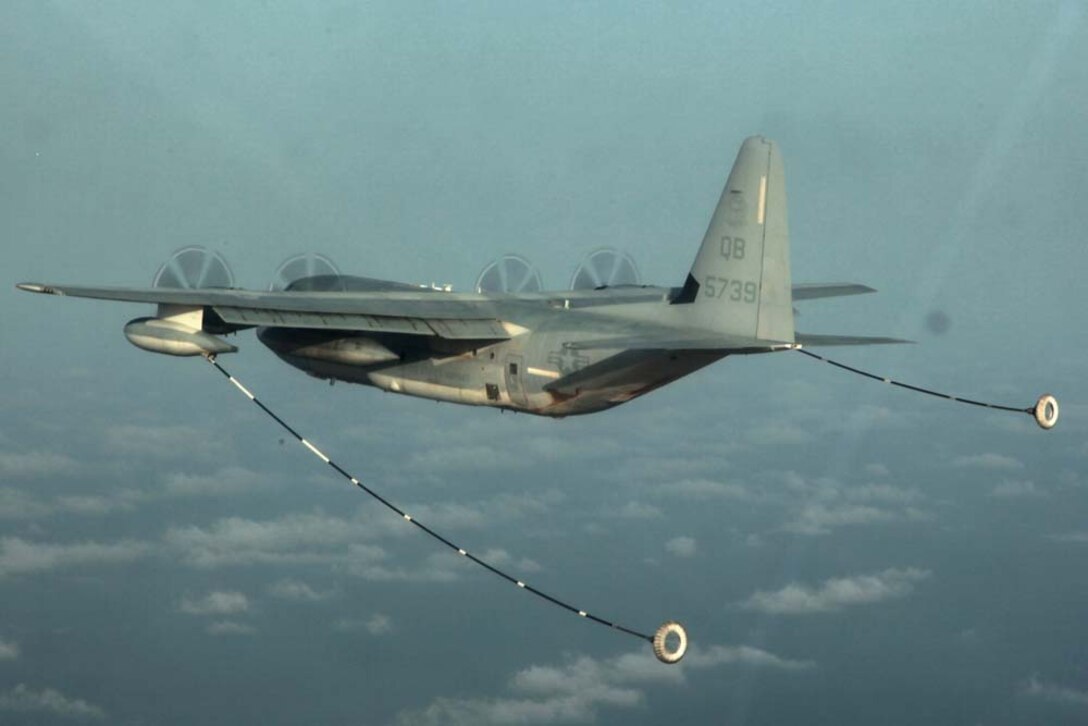 A KC-130 Hercules with Marine Medium Helicopter Squadron 364 (Rein.), 15th Marine Expeditionary Unit, prepares to refuel a CH-53E Super Stallion during air refueling training in the U.S. 5th Fleet area of responsibility, March 14. The 15th MEU is deployed as part of the Peleliu Amphibious Ready Group as a U.S. Central Command theater reserve force, providing support for maritime security operations and theater security cooperation efforts in the U.S. 5th Fleet area of responsibility. (U.S. Marine Corps photo by Cpl. John Robbart III)