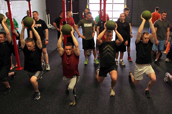 Marines from several offices with Recruiting Station Twin Cities practice CrossFit workouts March 18. Twenty Marines attended the three-day event to expand their training skillset and improve fitness levels in the Delayed Entry Program.