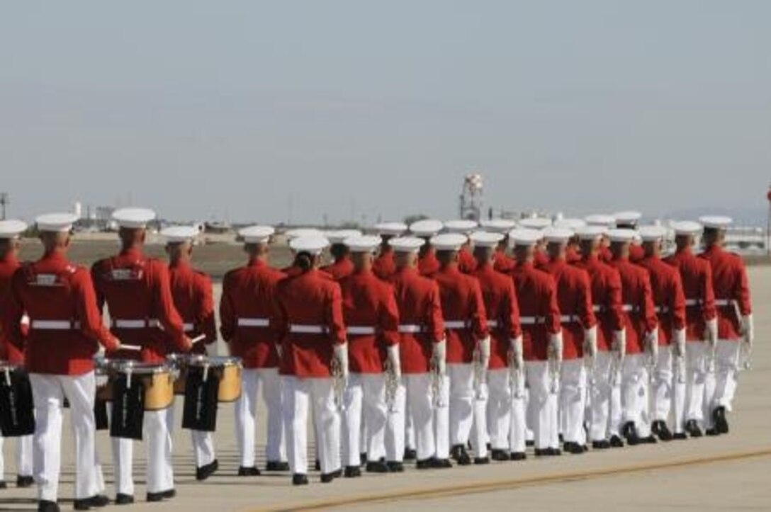 "The Commandant’s Own” Marine Drum and Bugle Corps departs the flight line after performing in front of thousands of spectators as a part of the opening ceremony for the 51st Annual Marine Corps Air Station Air Show, March 9.


