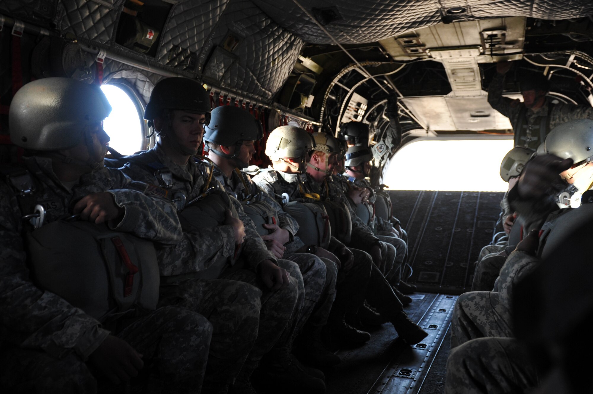 The 10th Special Forces Group members ride on a CH-47 Chinook before parachuting for a training mission March 6, 2013, at Fort Carson, Colo. With the assistance of the Colorado Army National Guard Aviation Support Facility members and assets, 10th SFG members parachuted from the Chinook as part of a training mission. (U.S. Air Force photo by Airman 1st Class Riley Johnson/Released)