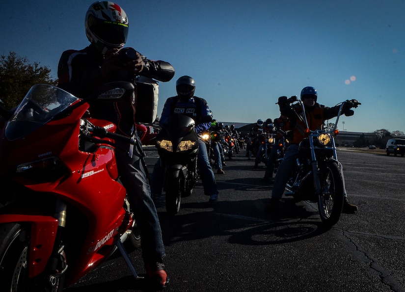 Motorcycle riders from Joint Base Charleston line up before a group ride March 15, 2013, at Joint Base Charleston – Air Base. More than 200 Airmen, Sailors, Soldiers, civilians and dependents participated in the 2013 Joint Base Charleston Motorcycle Safety Rodeo. The safety event was hosted by the JB Charleston Safety Office and the Green Knights Military Motorcycle Club. (U.S. Air Force photo/Airman 1st Class Jared Trimarchi)