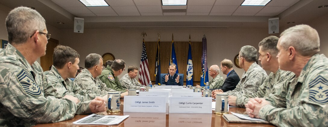 Gen. William M. Fraser III, commander of U.S. Transportation Command, receives a mission briefing during a visit to the Kentucky Air National Guard Base in Louisville, Ky., on March 12, 2013. Fraser was on base to learn more about the 123rd Airlift Wing. (U.S. Air Force Photo by Master Sgt. Phil Speck)