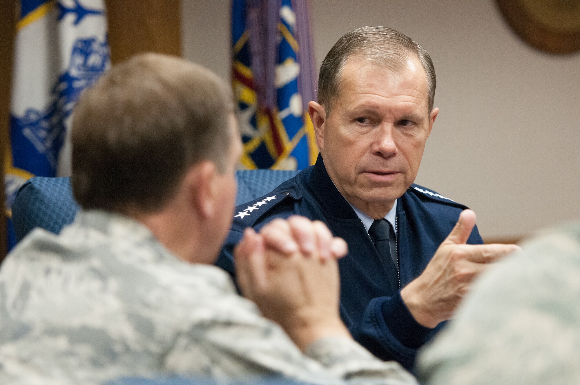 Gen. William M. Fraser III (right), commander of U.S. Transportation Command, speaks with Kentucky’s adjutant general, Maj. Gen. Edward W. Tonini, during a visit to the Kentucky Air National Guard Base in Louisville, Ky., on March 12, 2013. Fraser was on base to learn more about the mission and the Airmen of the 123rd Airlift Wing. (U.S. Air Force Photo by Master Sgt. Phil Speck)