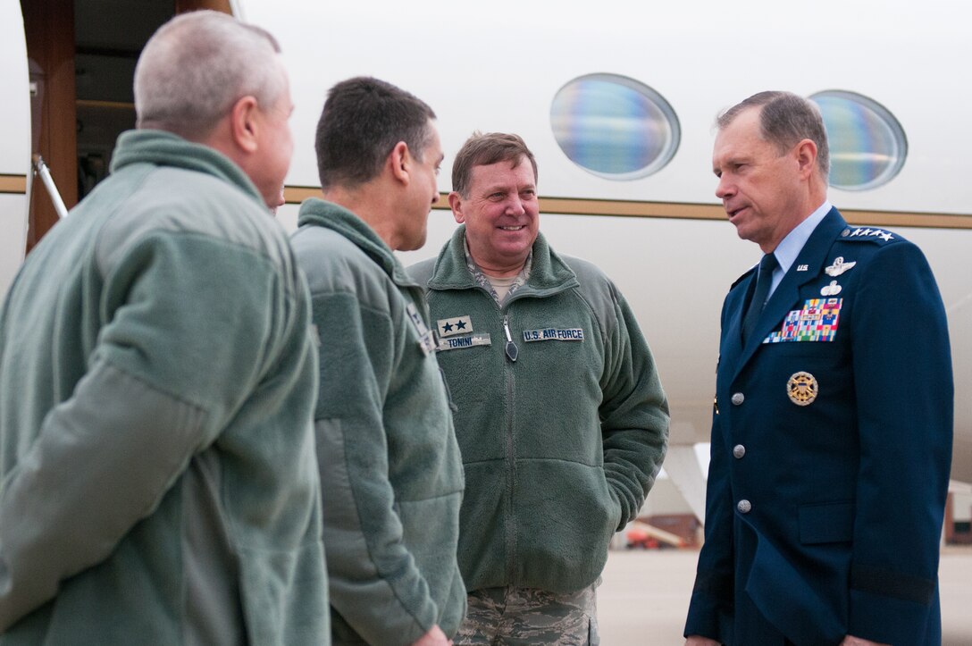 Gen. William M. Fraser III (right), commander of U.S. Transportation Command, is greeted by officials at the Kentucky Air National Guard Base in Louisville, Ky., on March 12, 2013. The welcoming party included (left to right) 123rd Airlift Wing Command Chief Master Sgt. Curtis Carpenter, 123rd Airlift Wing Commander Col. Warren Hurst, and Maj. Gen. Edward W. Tonini, Kentucky’s adjutant general. Fraser was visiting to learn more about the mission and the Airmen of the 123rd Airlift Wing. (U.S. Air Force Photo by Master Sgt. Phil Speck)