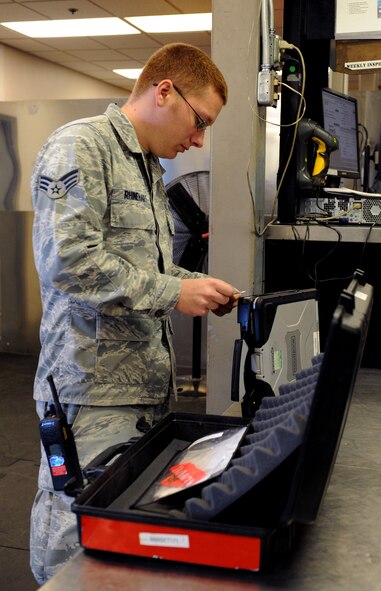 Senior Airman Kevin Rhinehart, 2nd Aircraft Maintenance Squadron Electronic Warfare section, views a discrepancy report for an item on Barksdale Air Force Base, La., March 19. Most equipment used by maintenance Airmen is checked out and turned in at the 2nd Aircraft Maintenance Squadron Support Section. (U.S. Air Force photo/Airman 1st Class Benjamin Gonsier)