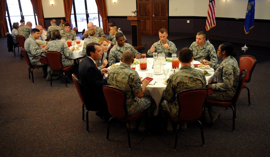 Barksdale Airmen and members of the community share lunch during the Operation Bright Holiday Luncheon on Barksdale Air Force Base, La., March 19. These community members help support Operation Bright Holiday which raises money to send Airmen home during the holidays. (U.S. Air Force photo/Airman 1st Class Benjamin Gonsier)
