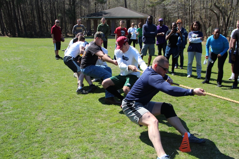 Airmen from the 628th Communications Squadron participate in a tug-of-war competition during Wingman Day March 14, 2013 at Joint Base Charleston – Air Base. Wingman Day provides an opportunity for JB Base Charleston units to take a well-needed break from their everyday routines and focus on what is truly important in this life: each other (Courtesy photo)