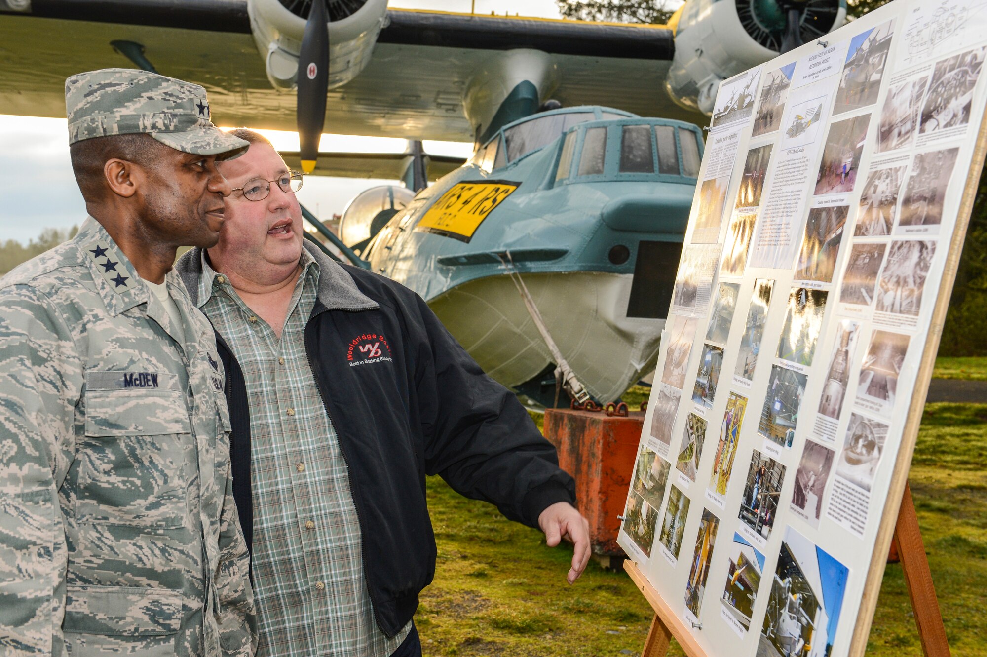 Ray Jordan, McChord Air Museum curator, briefs Lt. Gen. Darren McDew, 18th Air Force commander, on the museum’s recently restored SA-10A Catalina PBY "Flying Boat," March 15, 2013 at Joint Base Lewis-McChord, Wash. Museum volunteers rebuilt and repainted the aircraft to appear the same as it did when it was stationed here in the 1940s. (U.S. Air Force photo/Tech. Sgt. Sean Tobin)