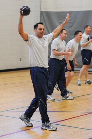 Tech. Sgt. Nolan Gibson, 437th Maintenance Operations Squadron Quality Assurance inspector, celebrates after eliminating an opponent from a dodge ball game during Wingman Day March 14, 2013, at the Joint Base Charleston – Air Base Fitness Center. Wingman Day provides an opportunity for JB Base Charleston units to take a well-needed break from their everyday routines and focus on what is truly important in this life: each other (Courtesy photo)